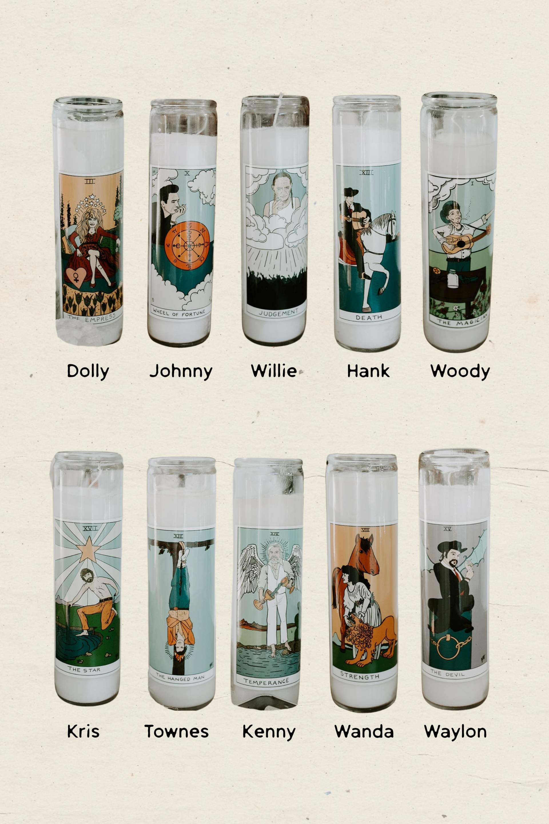 Collection of 10 Full color Country Outlaw Tarot Prayer Candles featuring vibrant folk art illustrations in 8-inch glass jars